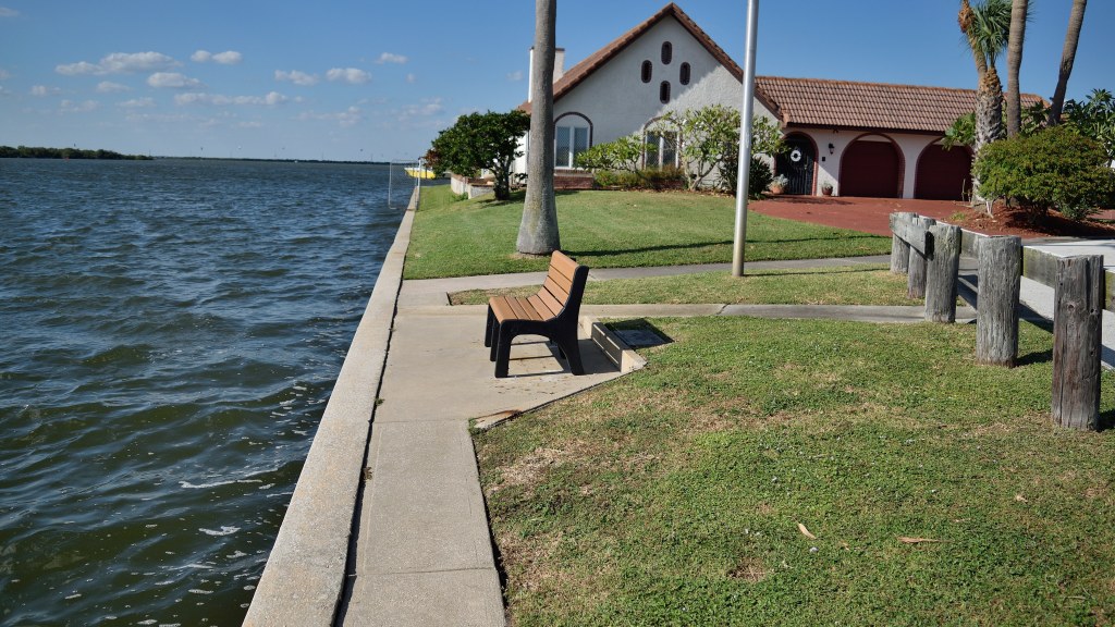 There is a bench overlooking the Banana River on the west end of S Banana River Blvd